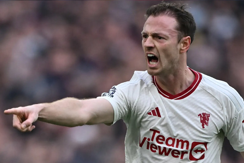 Gia tri cua Jonny Evans voi Man United khong chi la bong da. Anh: AFP