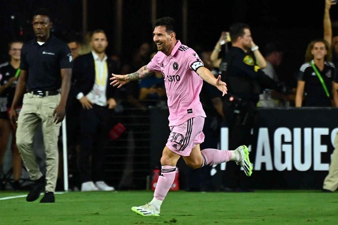 Messi va cac dong doi the hien tuong doi tot o vong bang. Anh: AFP