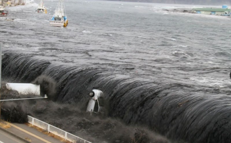 Waves break the breakwater in Miyako, Japan, on March 11, 2011. Photo: Miyako City Office