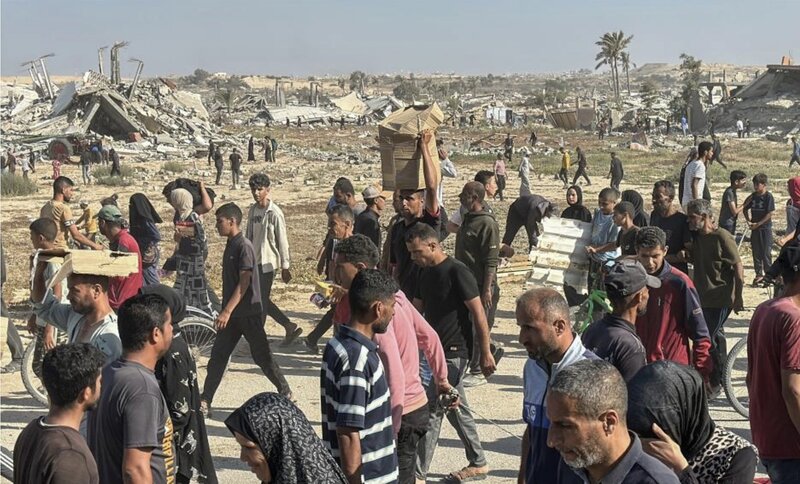 Un punto de distribucion de alimentos asistente en Gaza. Foto: Xinhua