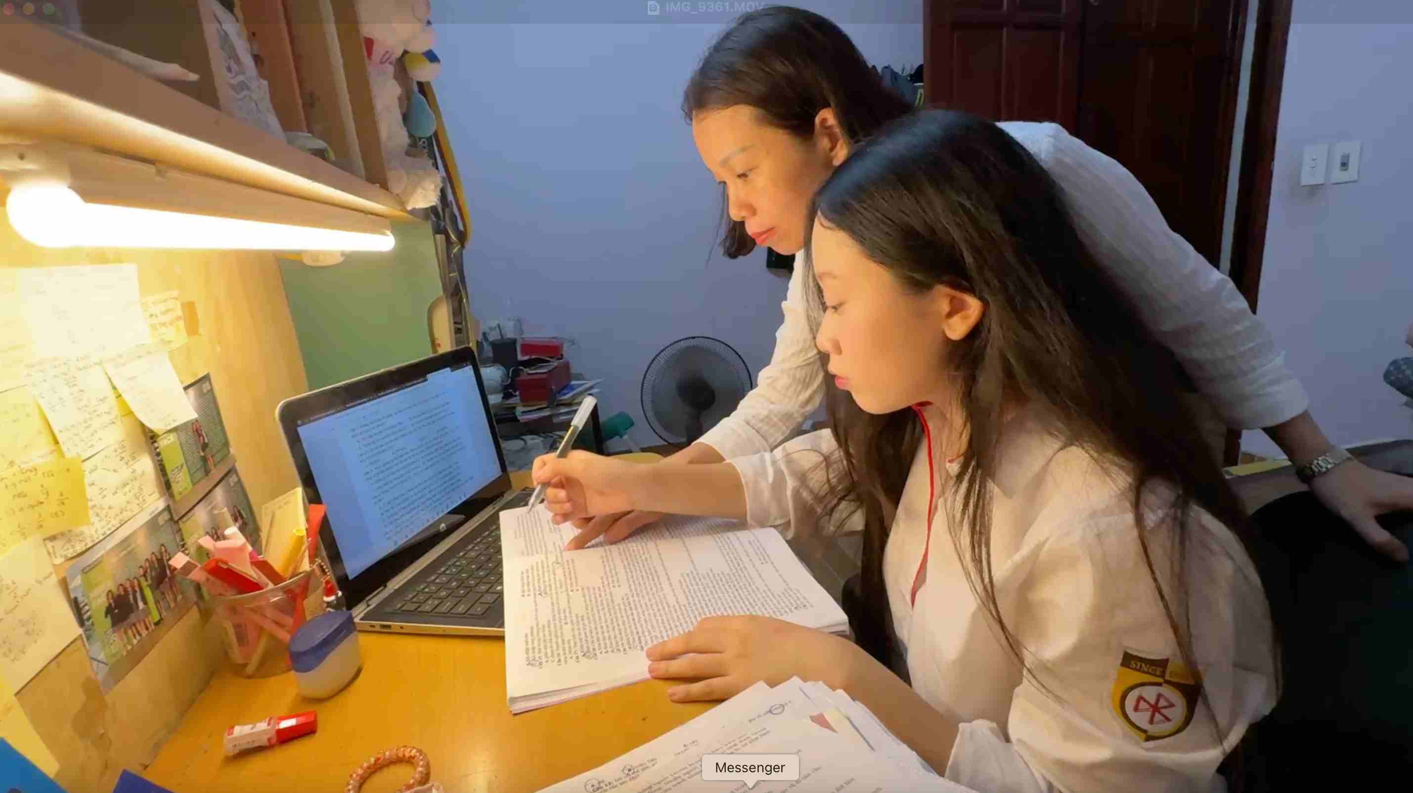 Parents accompany their children before the high school graduation exam.