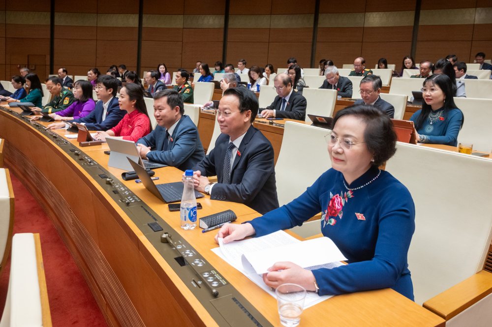 Continue aplicando una serie de mecanismos y politicas especificos en 4 provincias y ciudades despues de fusionar la provincia. Foto: Pham Dong