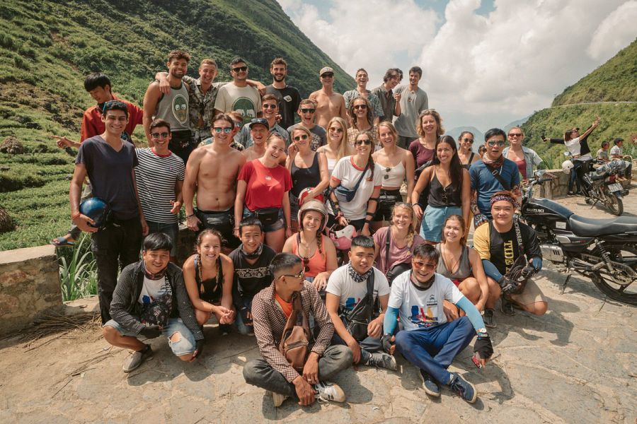 An international group took photos with local drivers in Ha Giang. Photo: Jasmine Ha Giang