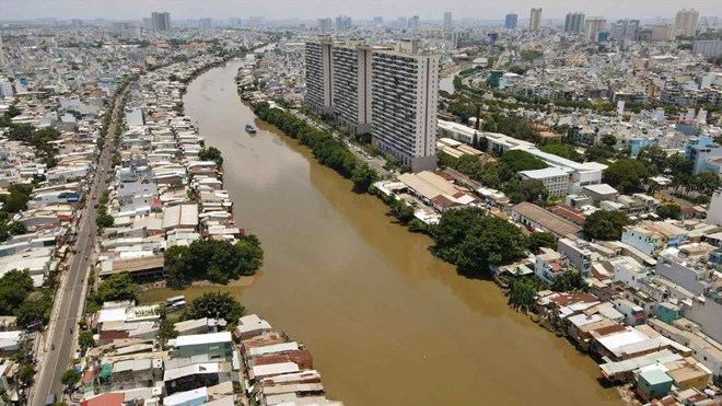 TPHCM se di doi gan 15.000 can nha ven kenh, rach o Quan 8. Anh: Anh Tu