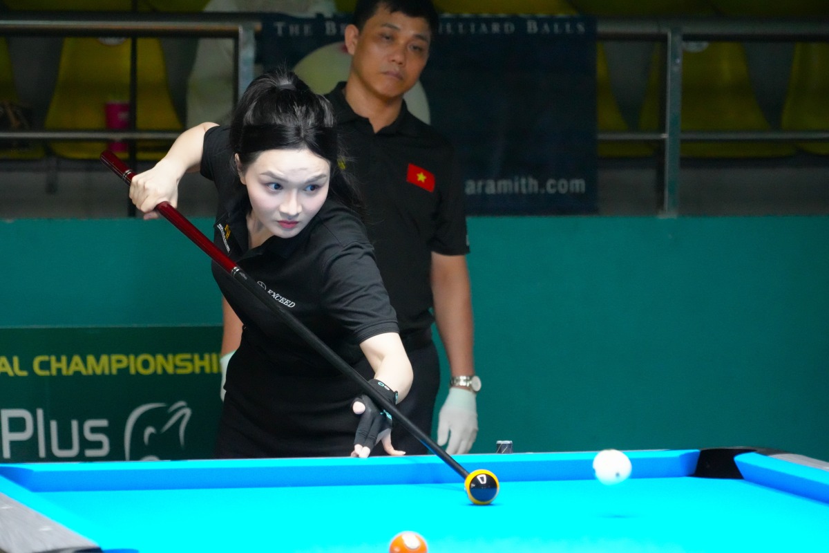 Mot co thu nu thi dau noi dung khac trong giai dau. Anh: Thanh An