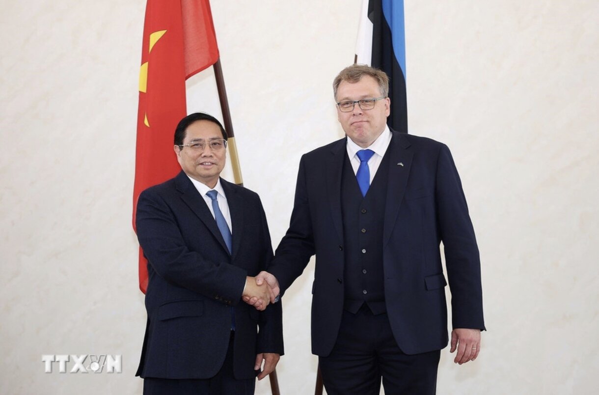 Politburo member, Prime Minister Pham Minh Chinh and Estonian National Assembly Chairman Lauri Hussar. Photo: VNA