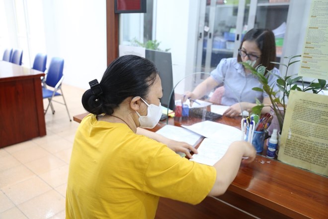 According to the draft, the economic department under the People's Committee at the commune level issues a construction permit. Photo: Huong Nha