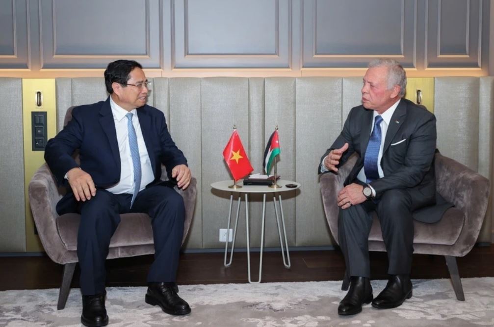 Miembro del Politburo, primer ministro Pham Minh Chinh Kien King Jordan Abdullah II bin al-Hussein. Foto: VNA