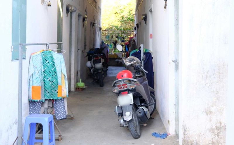 With over 30 rooms, Mrs. Dam's boarding house is packed with tenants. Photo: My Ly