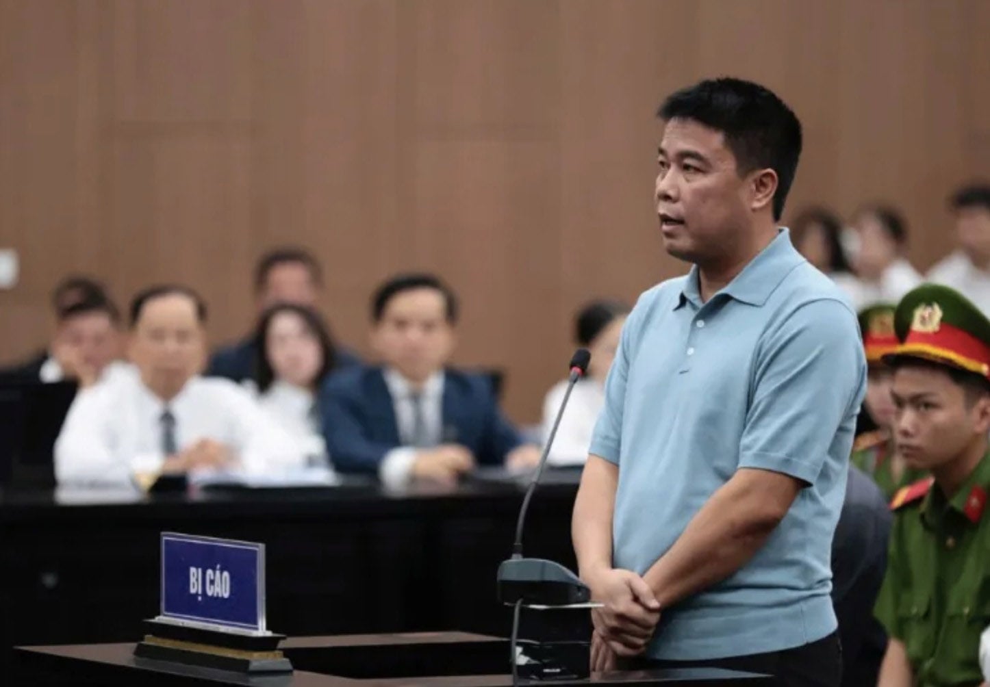 Cựu Chủ tịch Tập đoàn Phúc Sơn Nguyễn Văn Hậu trong phiên tòa sáng 11.7. Ảnh: Ân Xuân 