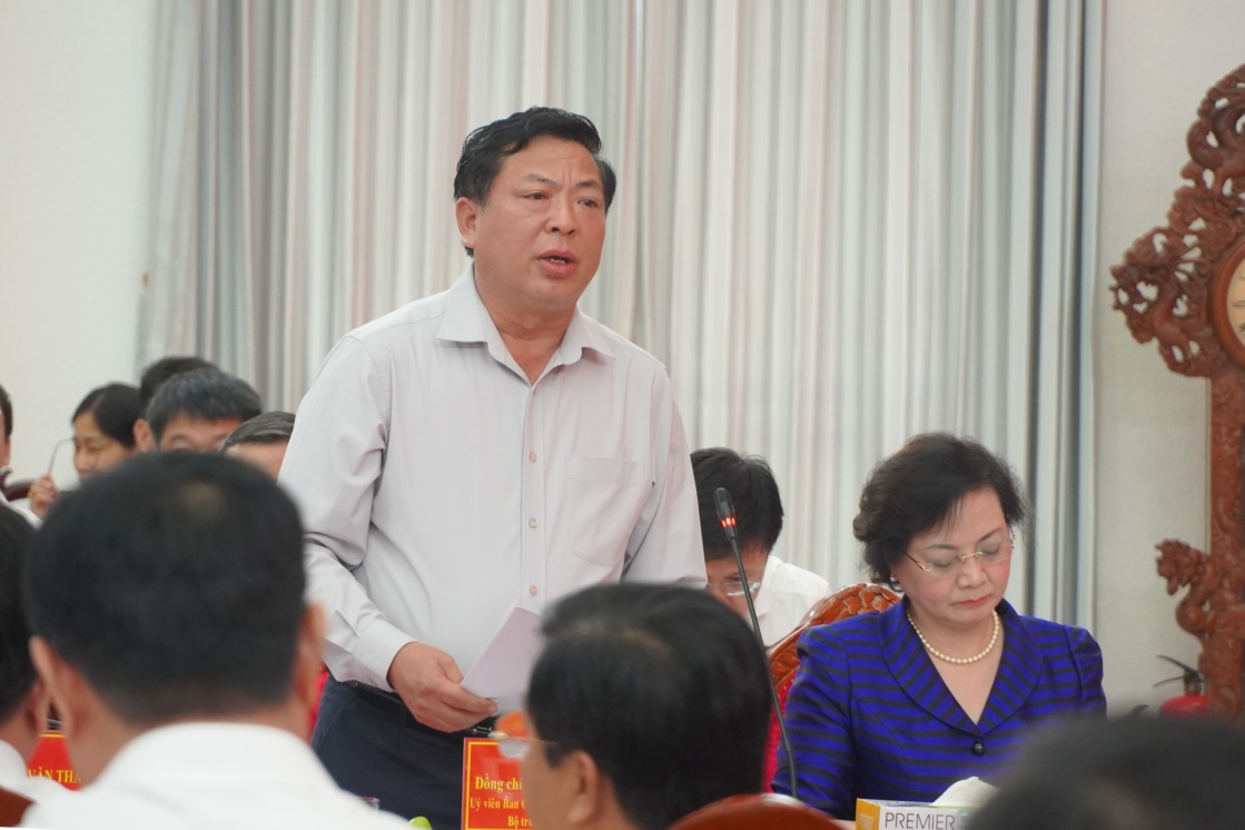 Bo truong Bo Xay dung Tran Hong Minh phat bieu tai hoi nghi. Anh: Ta Quang