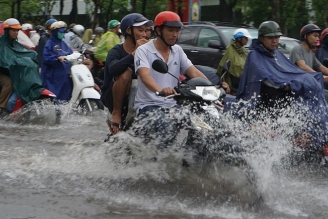Du bao thoi tiet hom nay 14.7, Bac Bo tiep tuc co mua rao va dong rai rac, cuc bo co mua to. Anh: Minh Quan