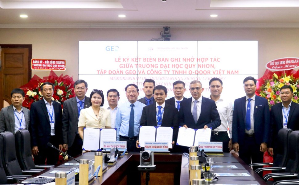 Quy Nhon University, GEO Group and O-DOOR Vietnam Co., Ltd. signed a memorandum of understanding on cooperation. Photo: Thuy Loan