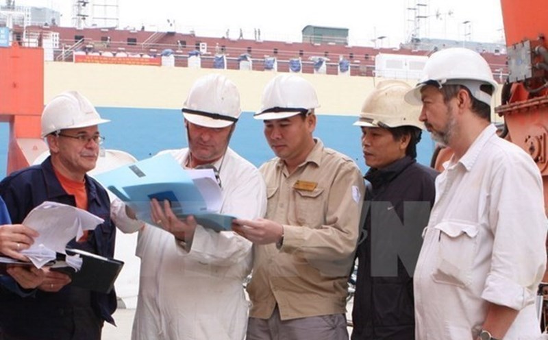 Which foreign workers are exempt from a license when working in Vietnam? Photo: VNA