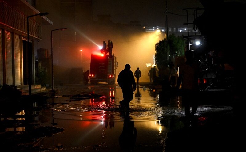 Iraq firefighters on duty in one fire. Photo: AFP
