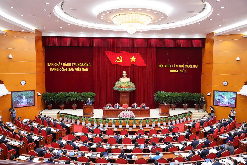 Sang 18.7, Hoi nghi lan thu 12 Ban Chap hanh Trung uong Dang khoa XIII khai mac trong the tai Thu do Ha Noi. Anh: Nhat Bac 