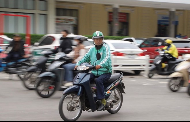 Xe om cong nghe o Ha Noi. Anh: Xuyen Dong