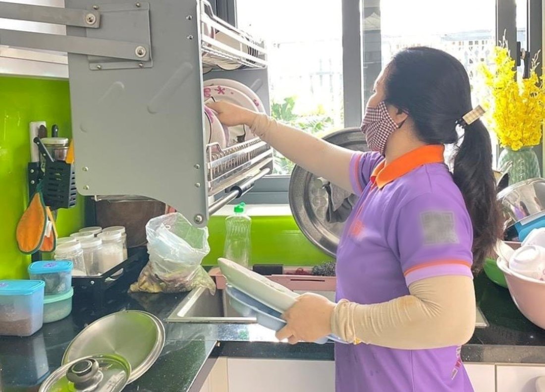 労働者の祝日、テト休暇制度は家族手伝いです。写真:Guvi