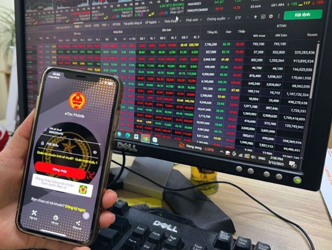 증권 양도 시 20% 세금 부과 가능. 사진: 프엉 안