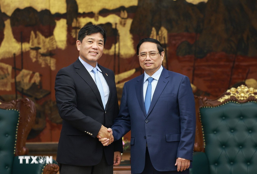 팜밍찡 총리의 정치국 위원 혼다 유키히토 씨 접견. 사진: TTXVN