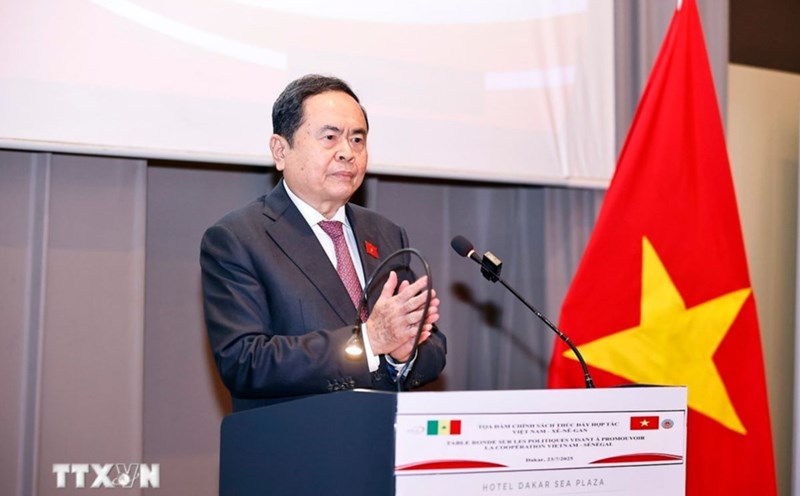 Politburo member and National Assembly Chairman Tran Thanh Man spoke at the seminar. Photo: VNA