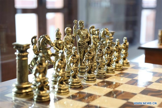 Young chess players won AI in a performance event. Photo: Xinhua