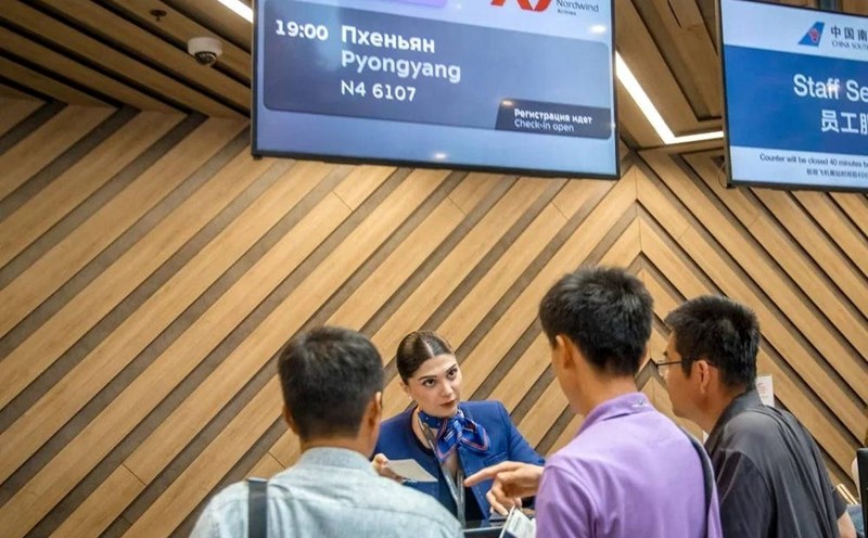 Passengers check in on a flight from Moscow, Russia to Pyongyang, North Korea. The airline will operate one flight per month. Photo: Russian Ministry of Transport