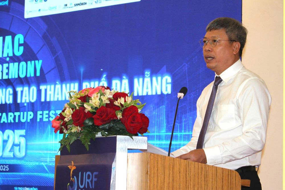 Ong Ho Quang Buu - Pho Chu tich UBND TP Da Nang chia se ve nhung quyet tam cua TP trong doi moi sang tao. Anh: Thanh Huyen