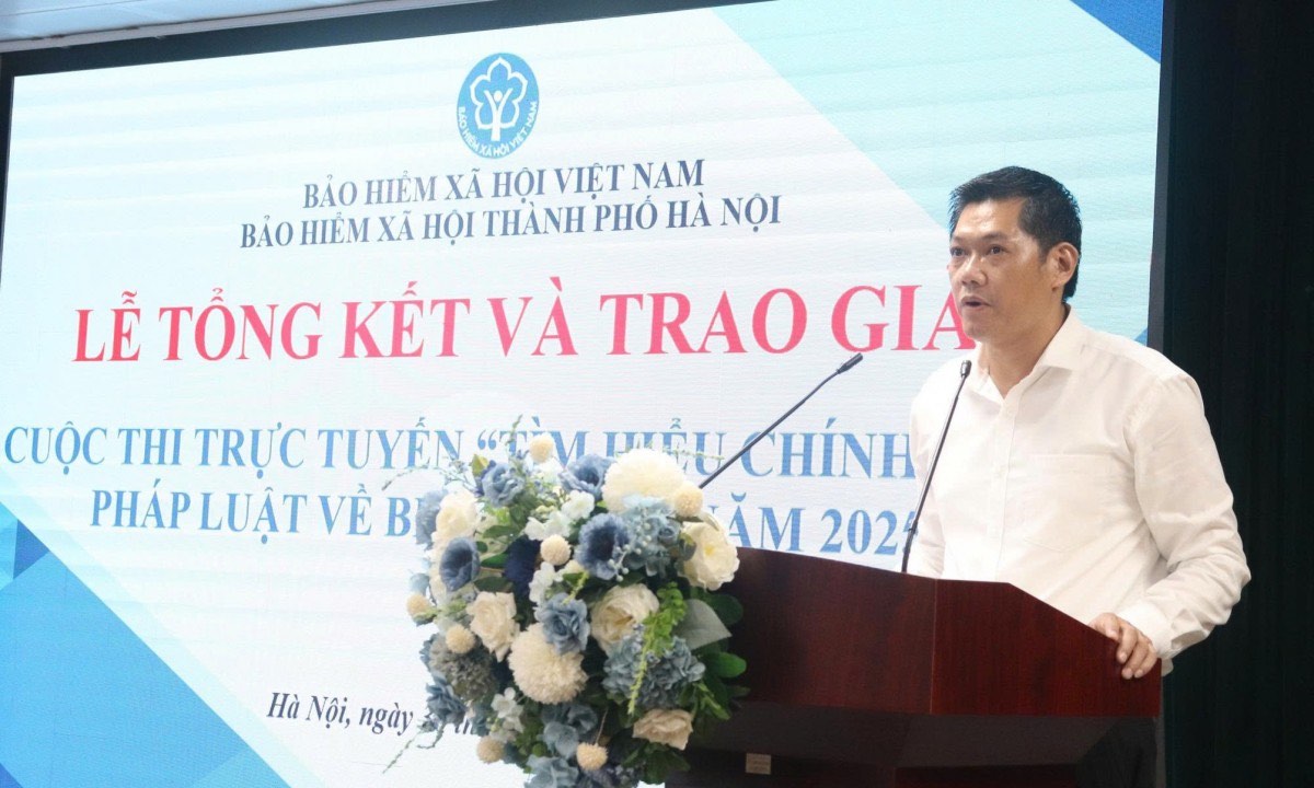 Ong Nguyen Ngoc Huyen - Giam doc BHXH TP Ha Noi, Truong Ban To chuc Cuoc thi phat bieu tai le trao giai. Anh: Lan Ngoc