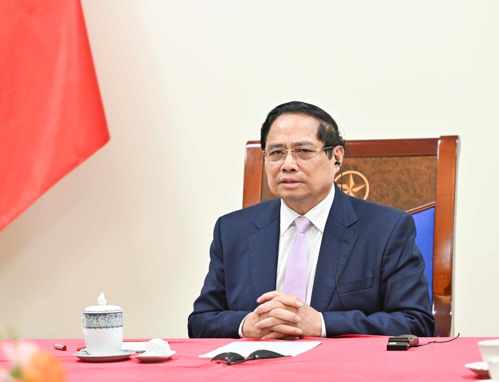 Politburo member and Prime Minister Pham Minh Chinh held a phone call with Malaysian Prime Minister Anwar Ibrahim. Photo: VGP