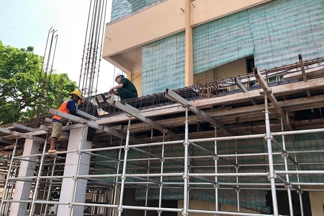 Tenga en cuenta los tramites al reparar una casa de nivel cuatro en terrenos rurales. Foto ilustrativa: Mai Huong