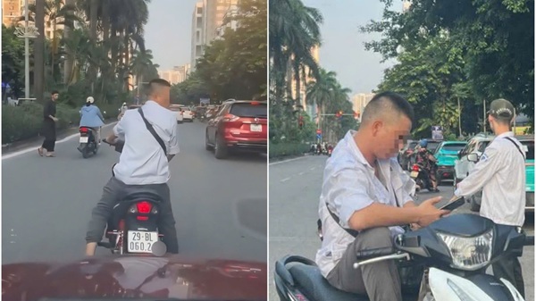 Công an Hà Nội vào cuộc xác minh việc người đàn ông chặn đường đòi tiền đỗ xe. Ảnh: Minh Phương