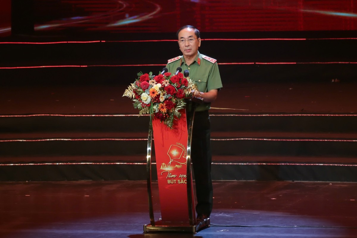 Thu truong Thuong truc Bo Cong an Tran Quoc To phat bieu tai chuong trinh. Anh: Huong Nha