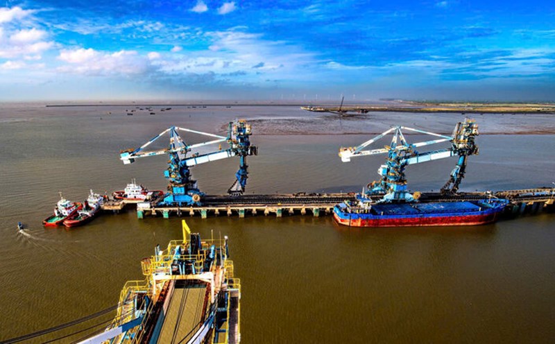 Loading and unloading of goods and transporting containers is bustling at seaports, boosting the local economy. Photo: Hoang Loc