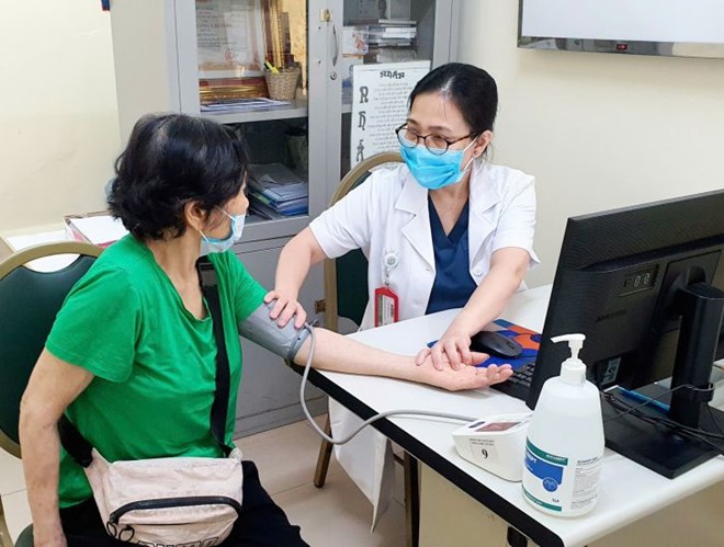 Medical examination and treatment at Bach Mai Hospital uses health insurance. Photo: Nguyen Ha