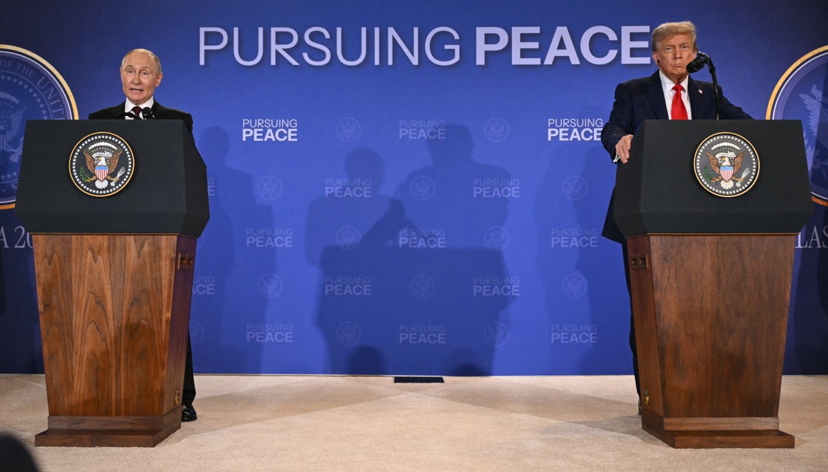 Tong thong Donald Trump va Tong thong Nga Vladimir Putin dang to chuc hop bao vao khoang 6h sang 16.8, gio Ha Noi. Anh: AFP 