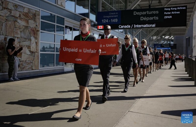 Air Canada flight attendants attended a silent protest at Vancouver International Airport on the National Action Day in Richmond, British Columbia, Canada, on August 11, 2025. Photo: Xinhua