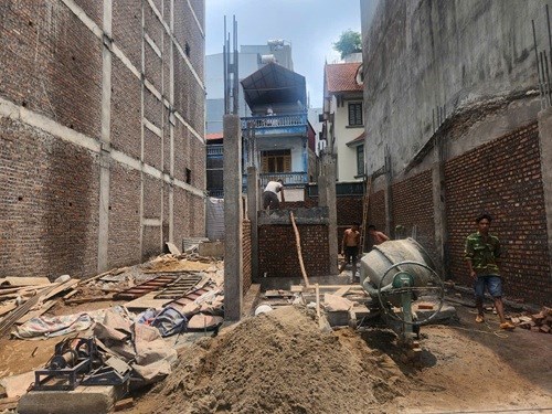 一部の地域では、住宅を建設する際に建設許可証が免除されます。写真:Minh Hanh