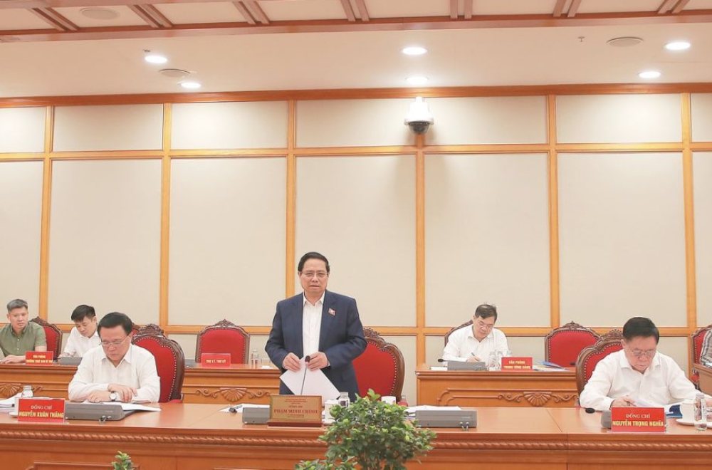 Politburo member, Prime Minister Pham Minh Chinh and the Working Group with the Standing Committee of the Son La Provincial Party Committee. Photo: Hien Hoa