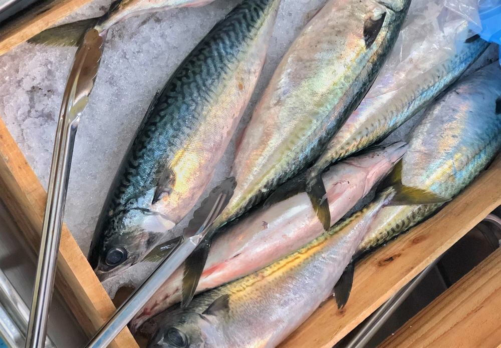 Add fish to your diet to help reduce arm fat. Photo: Thanh Thanh