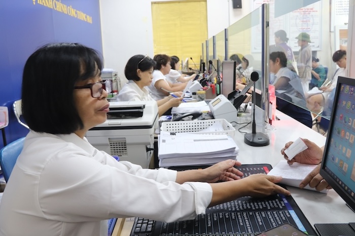 Hanoiは、人気のあるモデルのおかげで、管理上の背景を包括的に変更しています。写真：Nguyen Linh