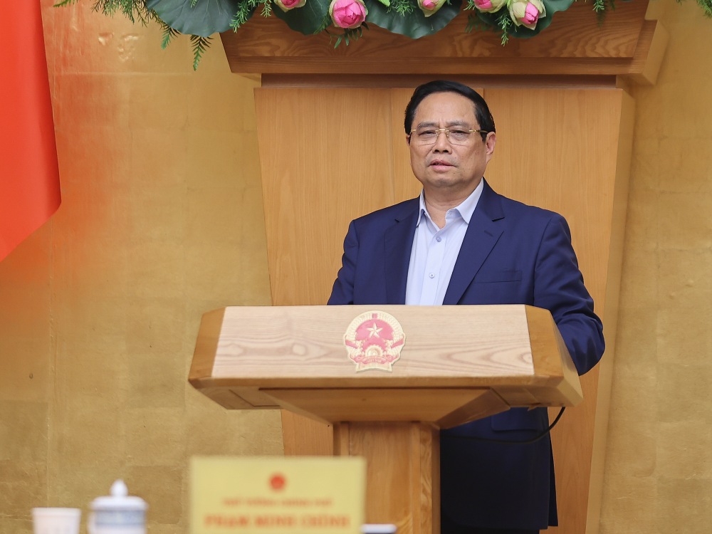 Politburo member and Prime Minister Pham Minh Chinh chaired a conference on the operation of local government at both levels. Photo: VGP