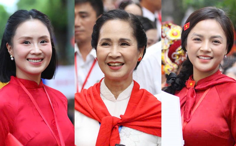 The cast wore ao dai and red scarves at the parade and parade on the evening of August 24. Photo: Huyen Chi