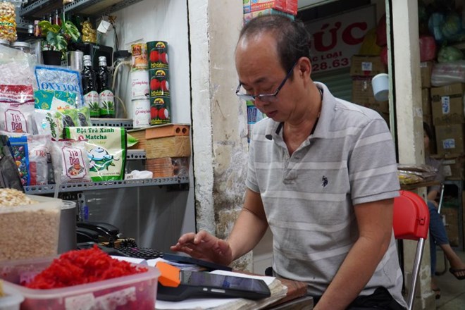 Proposition d'ajouter de nouvelles reglementations sur la declaration et la deduction fiscale des menages commerciaux. Photo : Ngoc Le