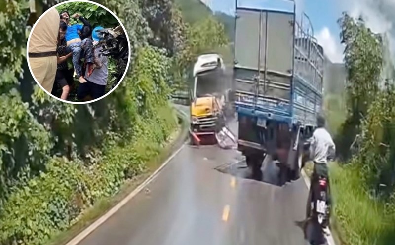 A passenger bus collided head-on with a truck on National Highway 3, causing a driver to have his foot crushed. Photo: Trong Bui