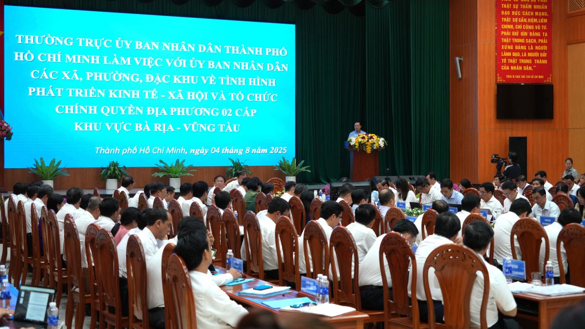 Quang canh buoi lam viec giua Thuong truc UBND TPHCM va 30 phuong, xa, dac khu. Anh: Thanh An