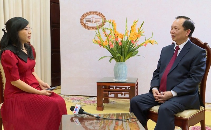 Permanent Deputy Governor of the State Bank of Vietnam Dao Minh Tu answered an interview with The Voice of Vietnam. Photo VOV