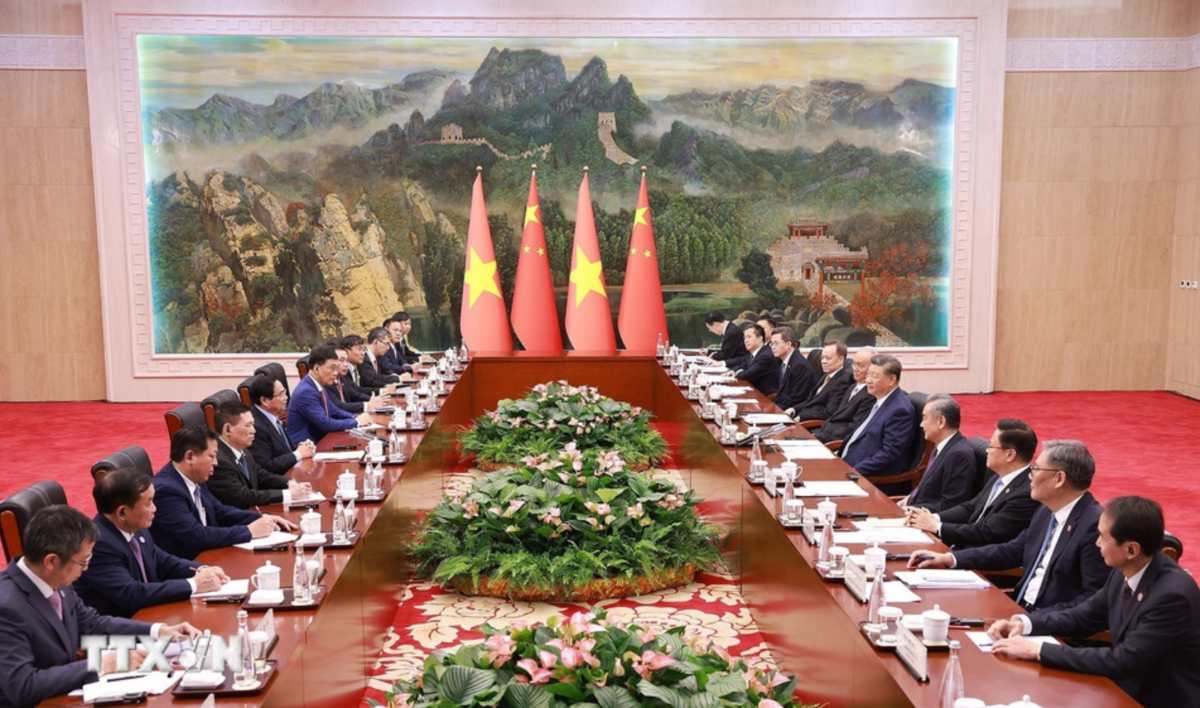Uy vien Bo Chinh tri, Thu tuong Chinh phu Pham Minh Chinh hoi kien Tong Bi thu, Chu tich nuoc Trung Quoc Tap Can Binh. Anh: TTXVN