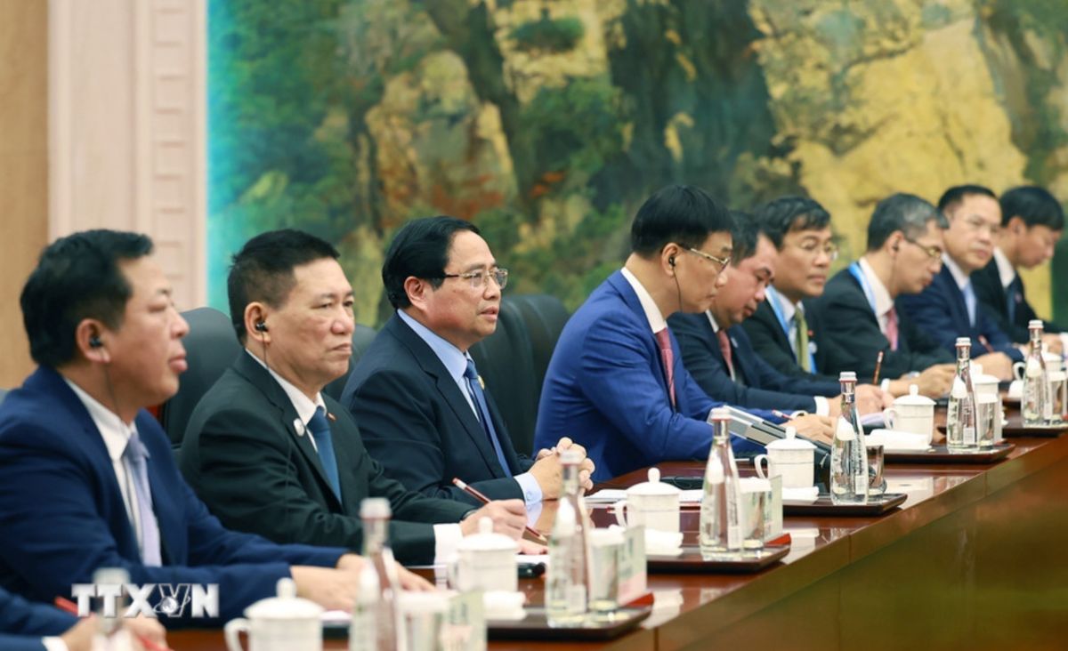 Uy vien Bo Chinh tri, Thu tuong Chinh phu Pham Minh Chinh hoi kien Tong Bi thu, Chu tich nuoc Trung Quoc Tap Can Binh. Anh: TTXVN