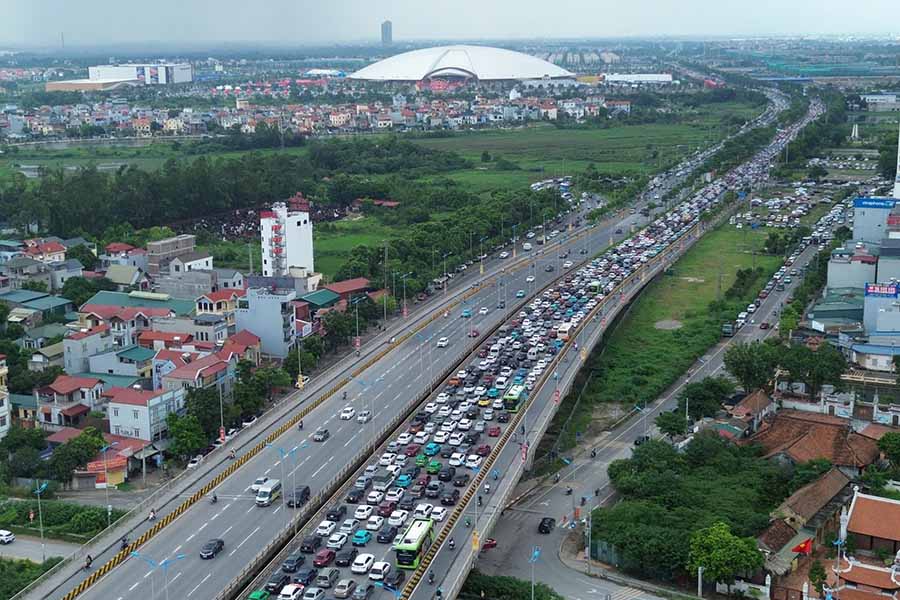 Tac duong den Trung tam Trien lam Viet Nam (VEC) o xa Dong Anh, Ha Noi. Anh: Tien Trach